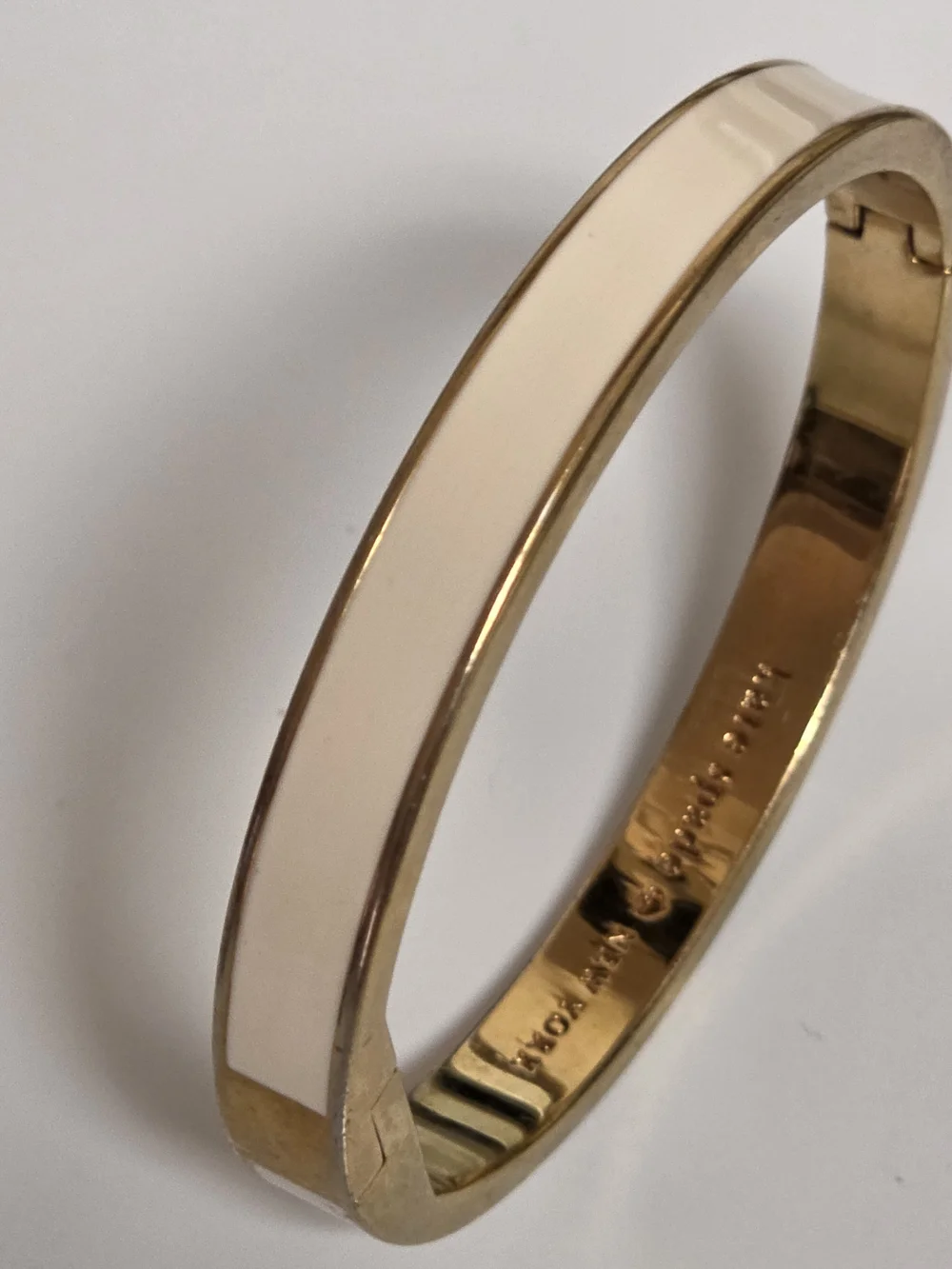 kate spade Gold Tone Bangle with Cream Enamel